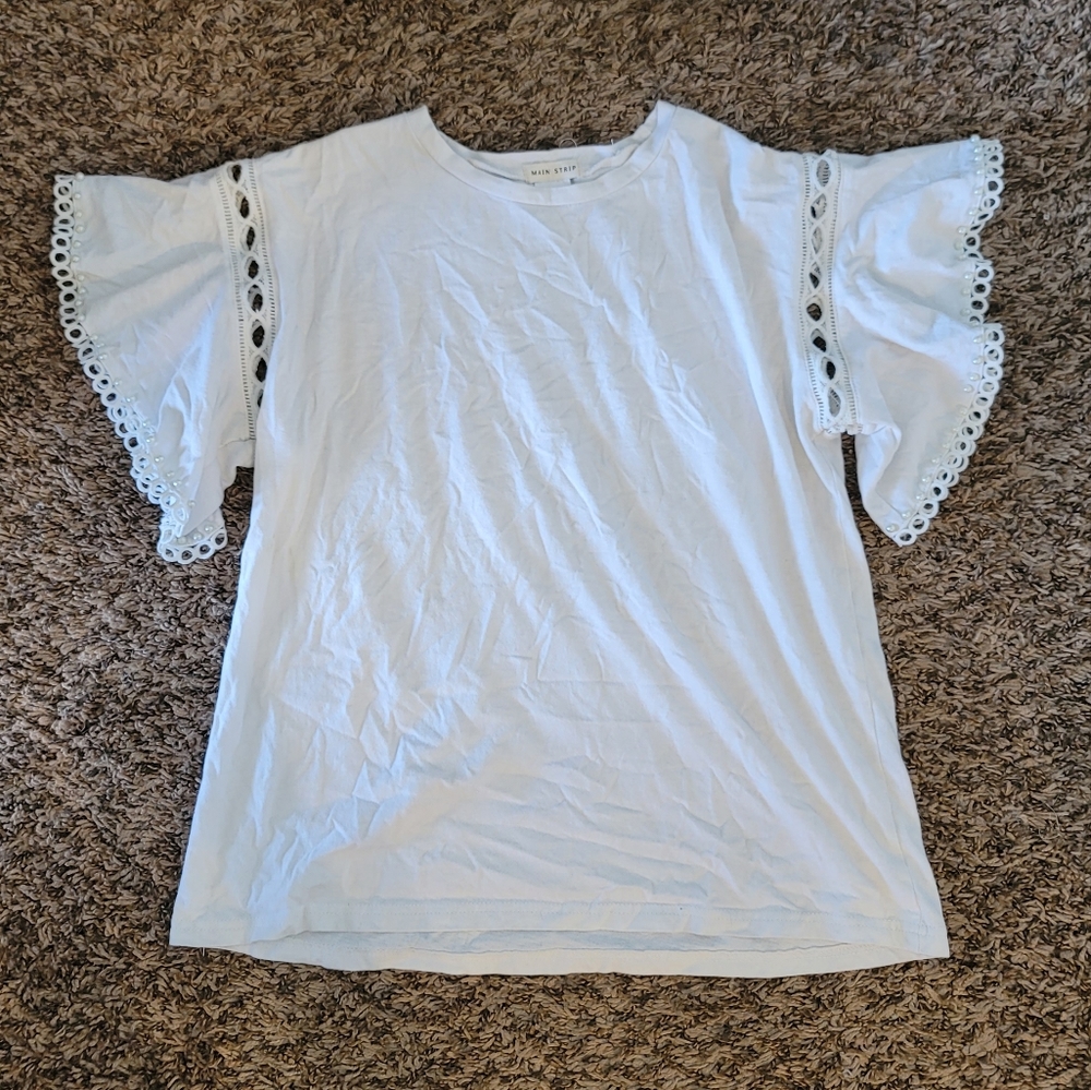 Adorable White Top with Sleeve Embellishments